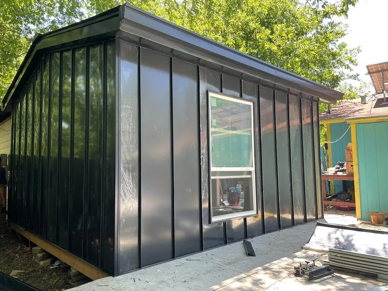 Black standing seam metal wall panels for Metal Roof Installation in La Grange